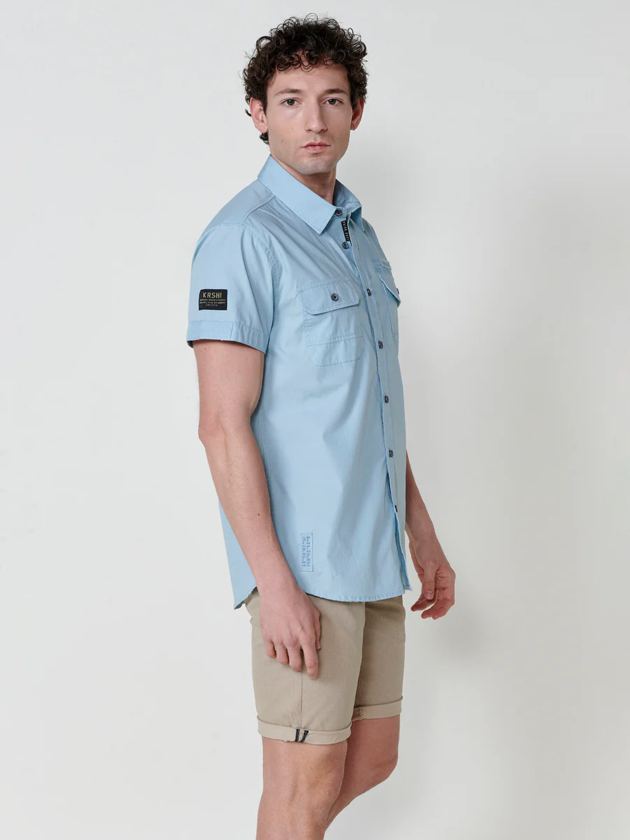 Camisa de manga corta de algodón con acabado en vuelta. cierre con botones. bolsillos con solapa. color azul para hombre - Image 13