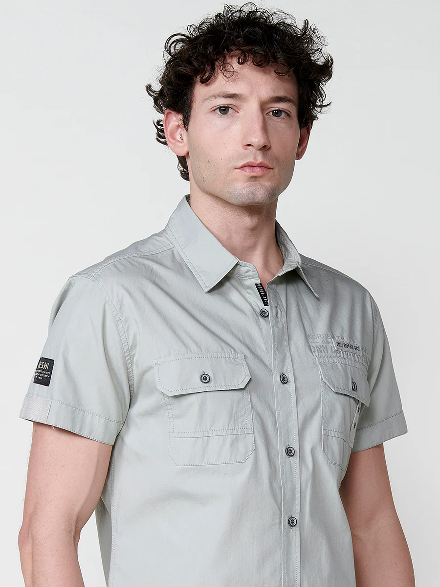 Camisa de manga corta de algodón con acabado en vuelta. cierre con botones. bolsillos con solapa. color azul para hombre - Image 19