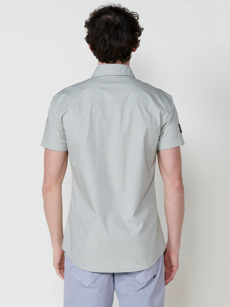 Camisa de manga corta de algodón con acabado en vuelta. cierre con botones. bolsillos con solapa. color azul para hombre - Image 22