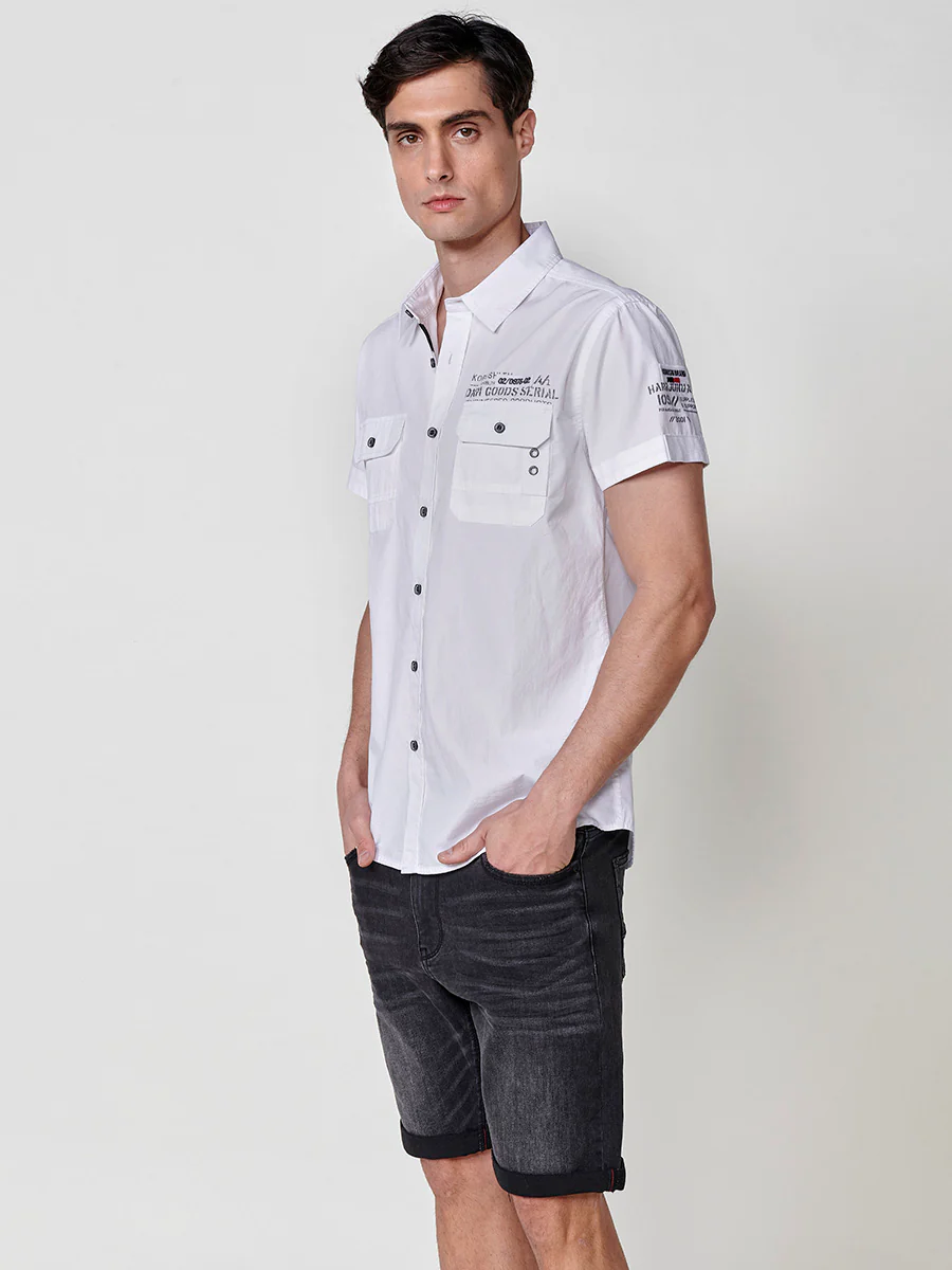 Camisa de manga corta de algodón con acabado en vuelta. cierre con botones. bolsillos con solapa. color azul para hombre - Image 3
