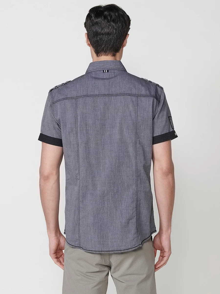 Camisa de manga corta de algodón. puños vueltos, cierre con botones y bolsillos con solapa. - Image 14
