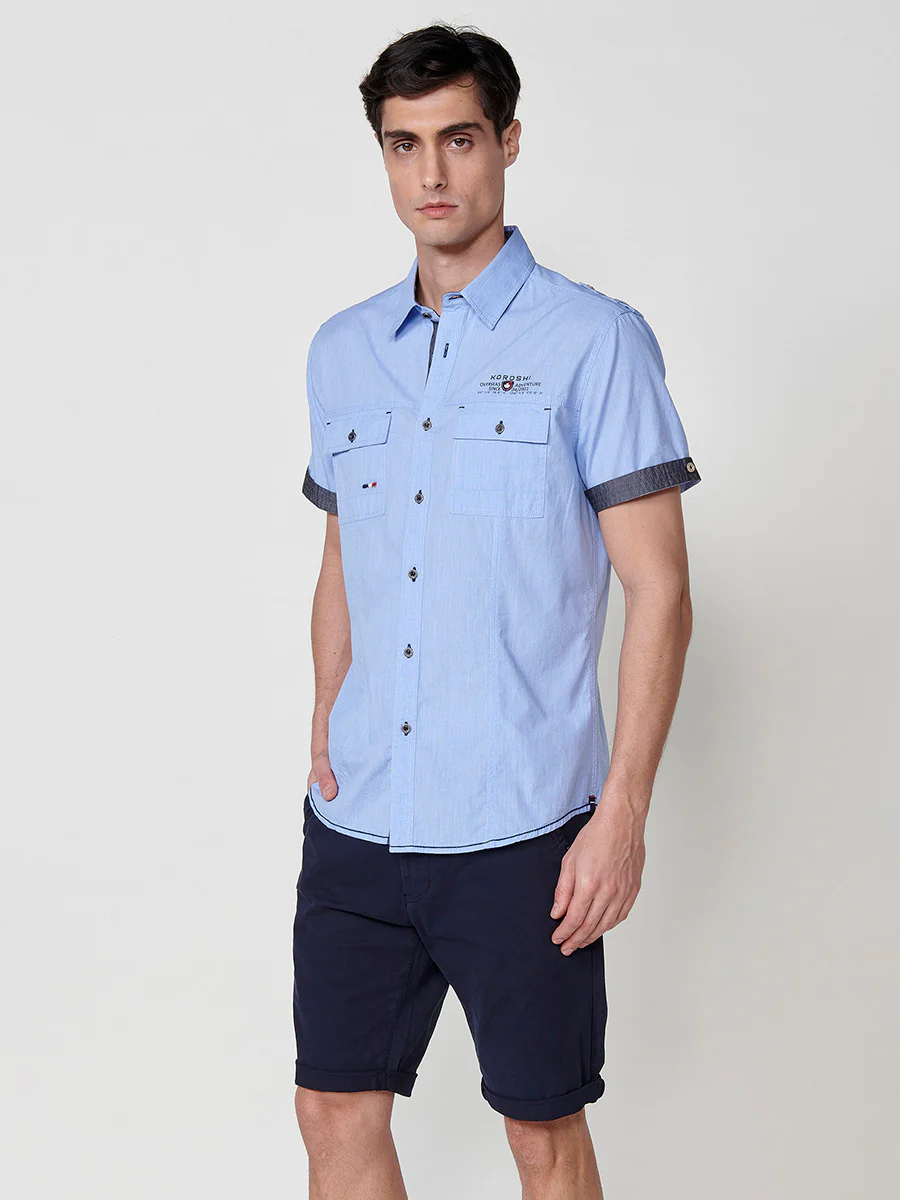 Camisa de manga corta de algodón. puños vueltos, cierre con botones y bolsillos con solapa. - Image 15