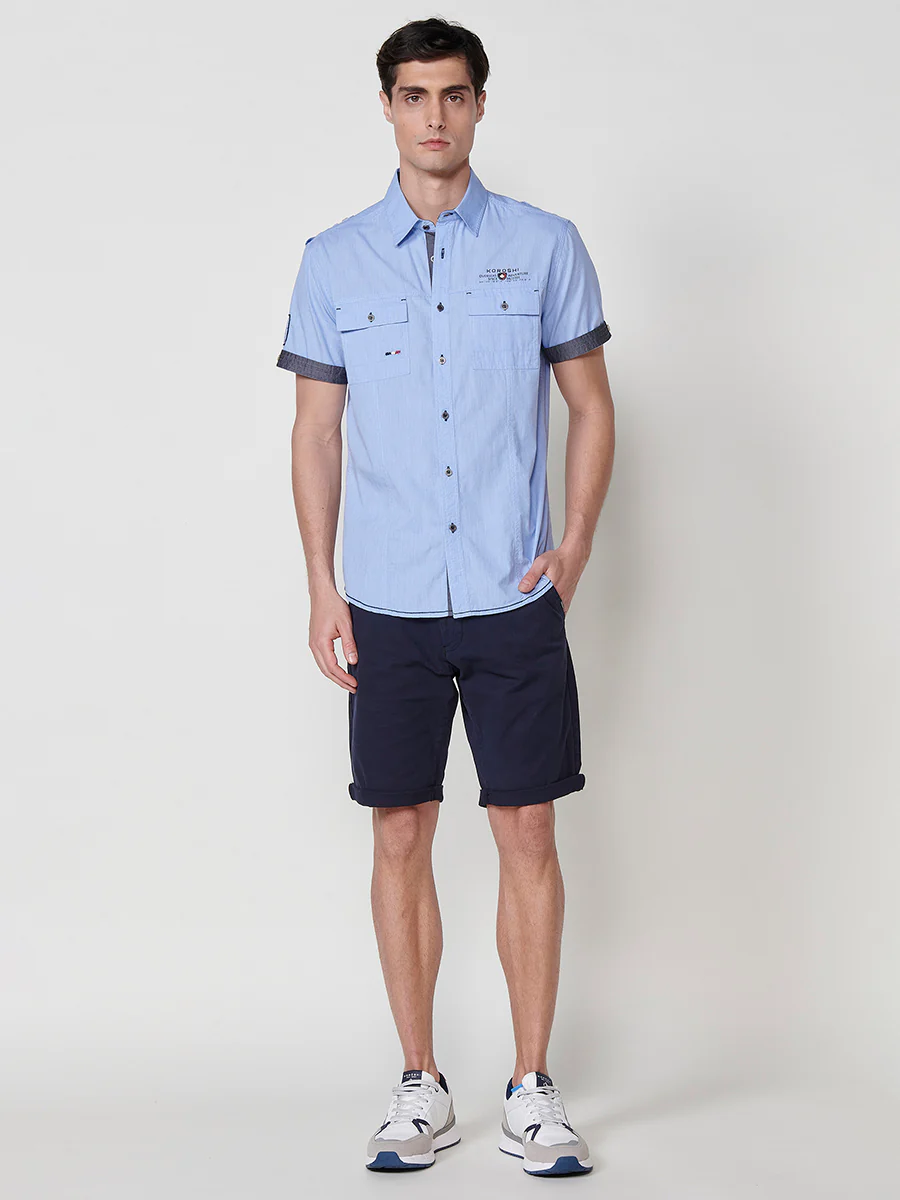 Camisa de manga corta de algodón. puños vueltos, cierre con botones y bolsillos con solapa. - Image 16