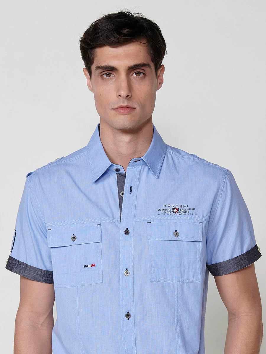 Camisa de manga corta de algodón. puños vueltos, cierre con botones y bolsillos con solapa. - Image 18