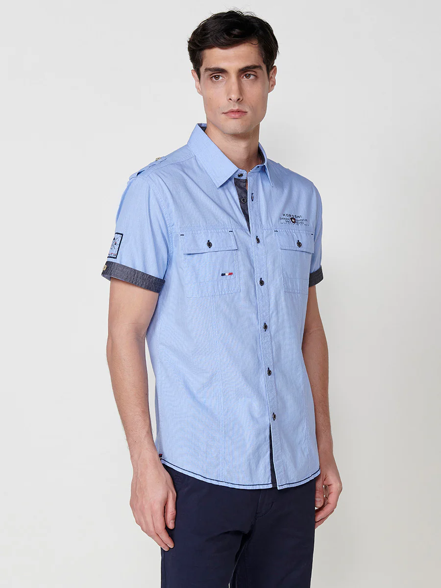 Camisa de manga corta de algodón. puños vueltos, cierre con botones y bolsillos con solapa. - Image 19