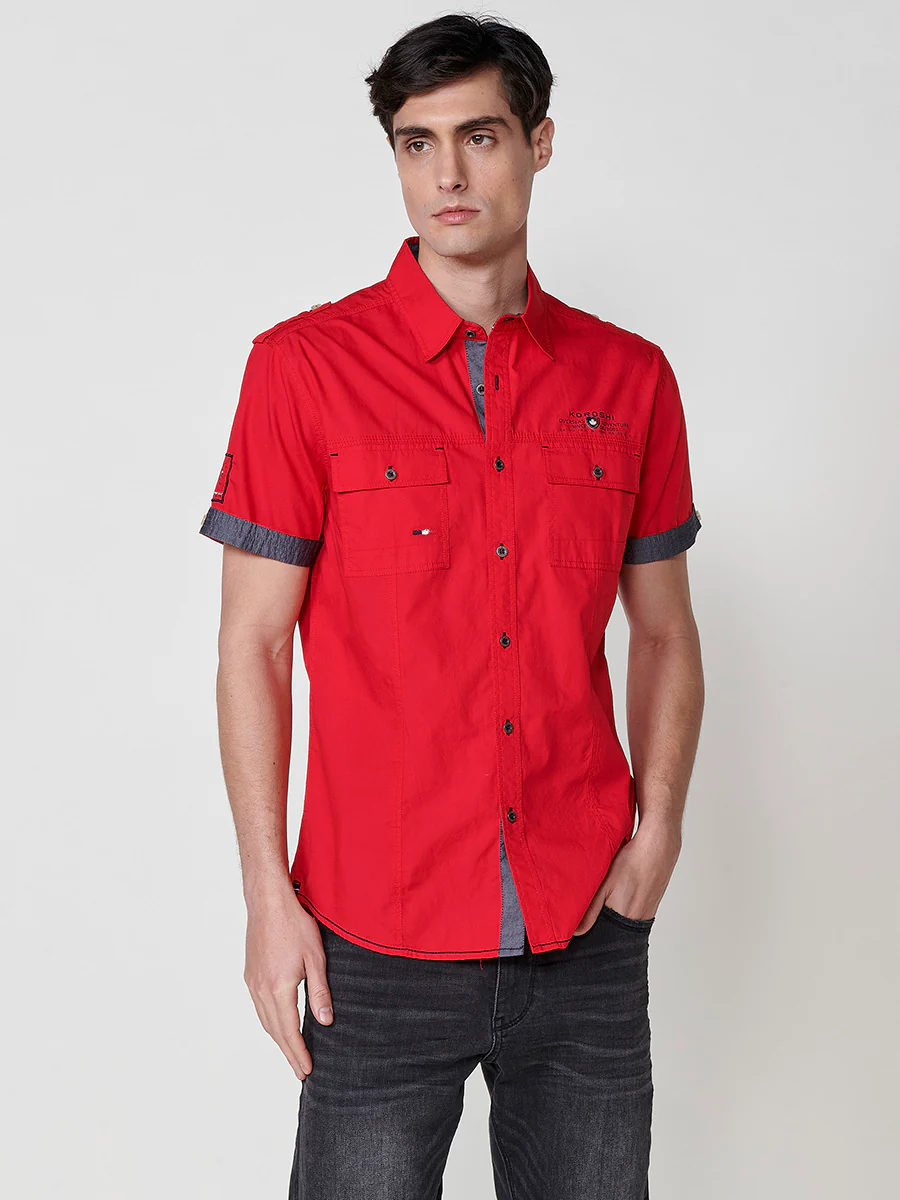 Camisa de manga corta de algodón. puños vueltos, cierre con botones y bolsillos con solapa. - Image 22