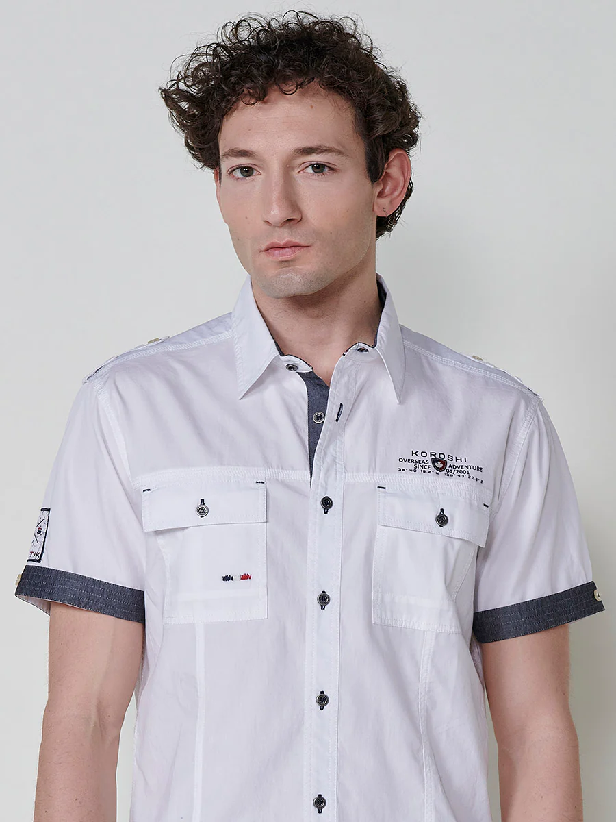 Camisa de manga corta de algodón. puños vueltos, cierre con botones y bolsillos con solapa. - Image 3