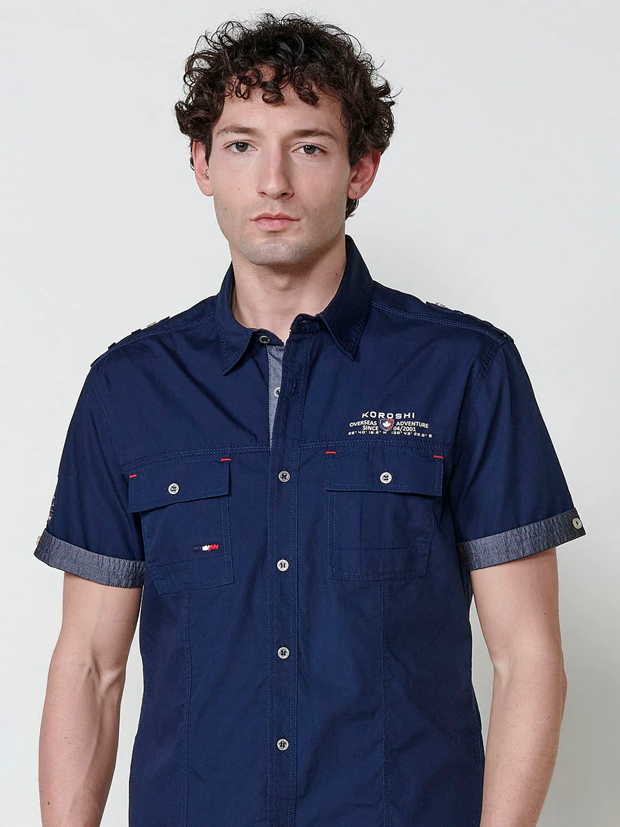 Camisa de manga corta de algodón. puños vueltos, cierre con botones y bolsillos con solapa. - Image 32